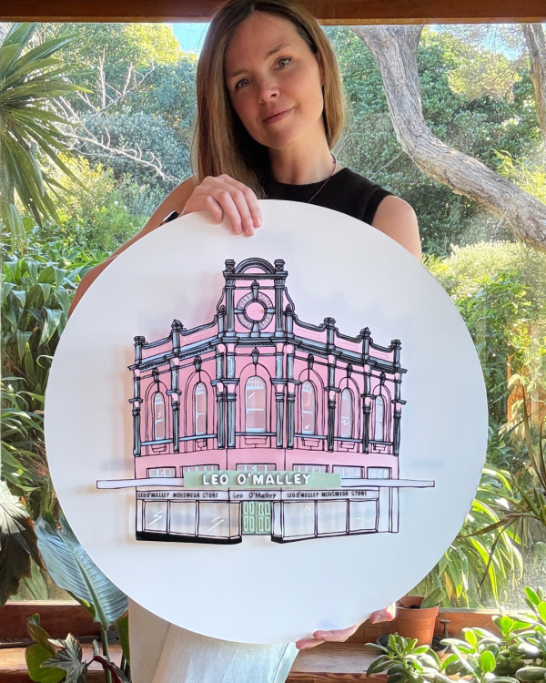 Satey Fraser-Allen and her replication of Leo O'Malley made of acrylic is secured onto a white circular backing 