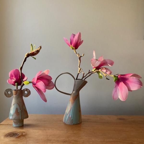 Ceramic vases by Pip Woods with wilting magnolias.