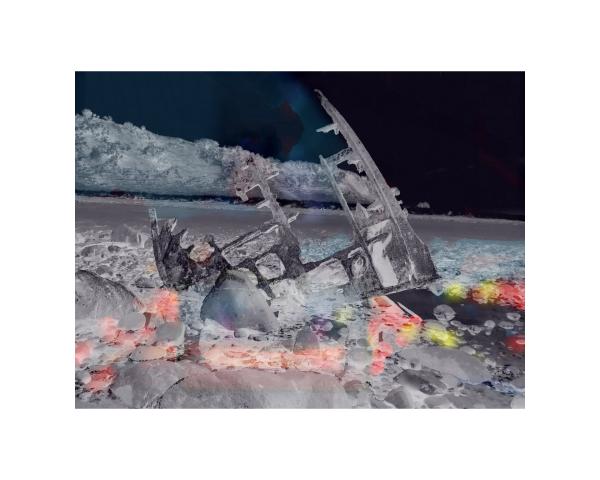 Artwork by Neil Johnstone. Wreckage in a rocky shore, sticking upright between boulders. A headland in the back. All is silvery against a black sky. Coral coloured flares of light dance across the foreground.