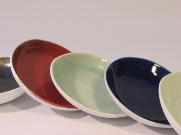 Ceramic saucers by Aimee McLeod