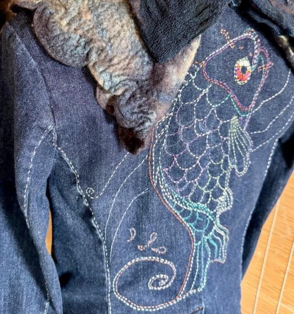 Sashiko stiching by Deb Donnelly. Koi fish design on back of an indigo jacket.