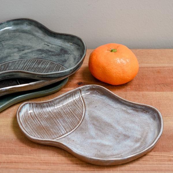 Freeform ceramic platters by Judith Ewens-Belin