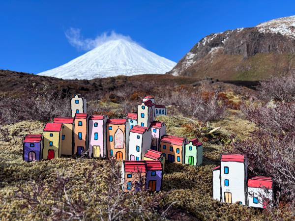Mediterranean building miniatures infront of Mount Tongariro by Marcel Baaijens