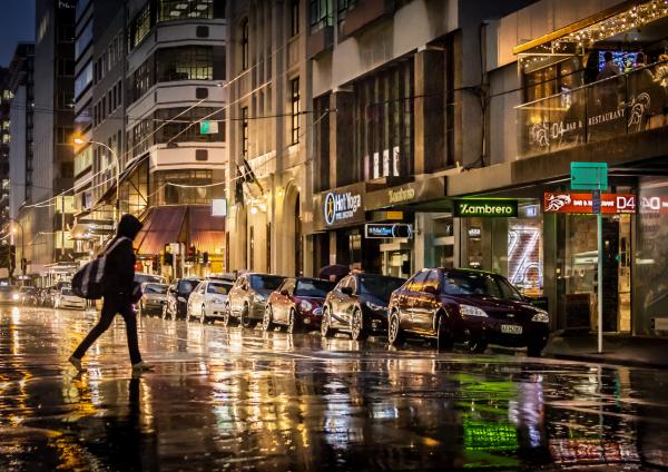 A crisp and moody photograph of Victoria Street in the rain